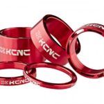ESPACIADORES DIRECCIÓN KCNC HOLLOW 28.6MM ROJO